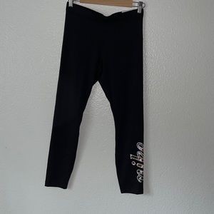 Nike tight fit leggings with floral swoosh